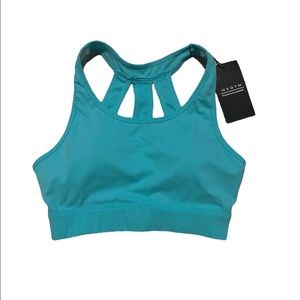 NWT womens teal NVGTN sports bra size s